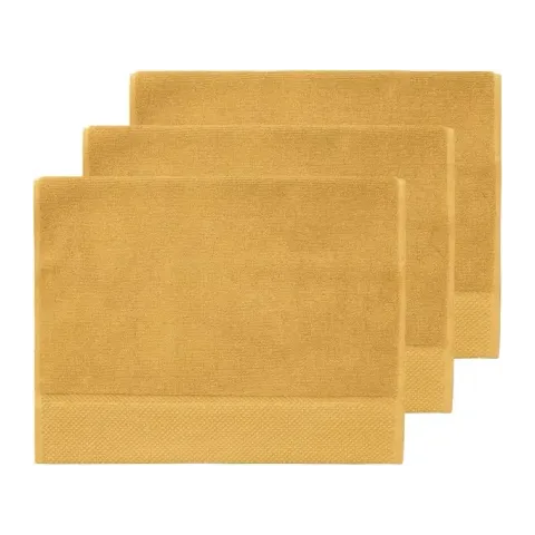 Serviette invité personnalisée brodée à Paris, coloris caramel (modèle Beaubourg, 100 % coton peigné zero-twist)