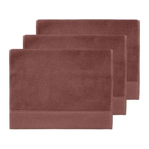 Serviette invité personnalisée brodée à Paris, coloris terre brûlée (modèle Beaubourg, 100 % coton peigné zero-twist)