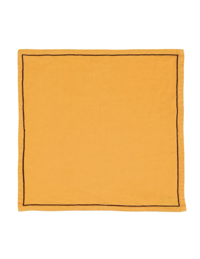 Serviette de table personnalisée brodée à Paris, coloris caramel (modèle Concorde, 52 % coton · 48 % lin)