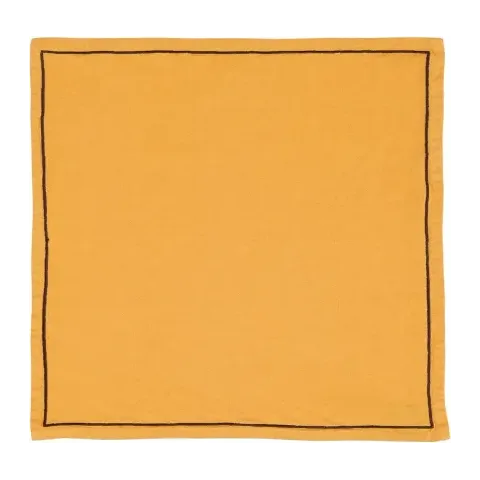 Serviette de table personnalisée brodée à Paris, coloris caramel (modèle Concorde, 52 % coton · 48 % lin)