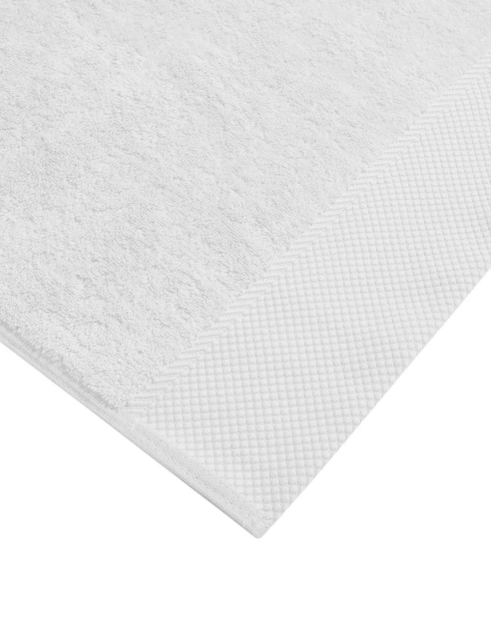 Serviette de bain personnalisée coloris blanc : gros plan sur la matière, 100 % coton peigné zero-twist (modèle Faubourg)